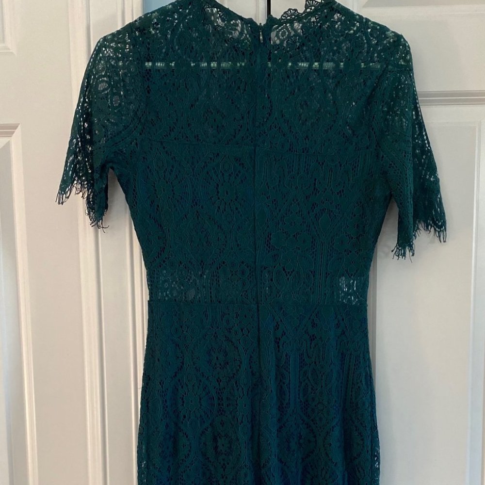 Green lace cut-out dress with fringe